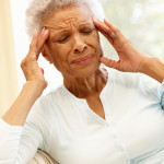 Senior African American woman with headache